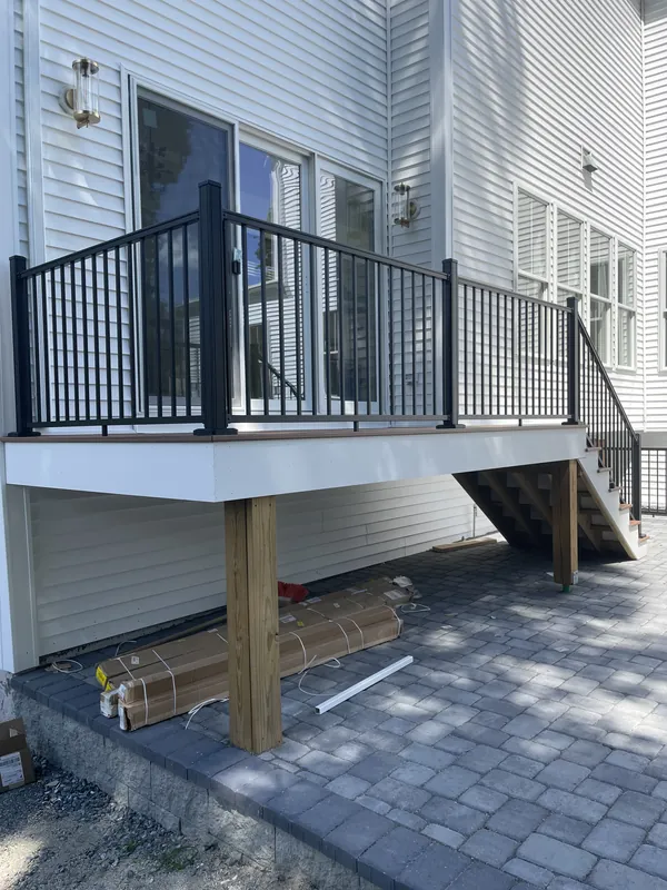 Black railing around an elevated outdoor deck